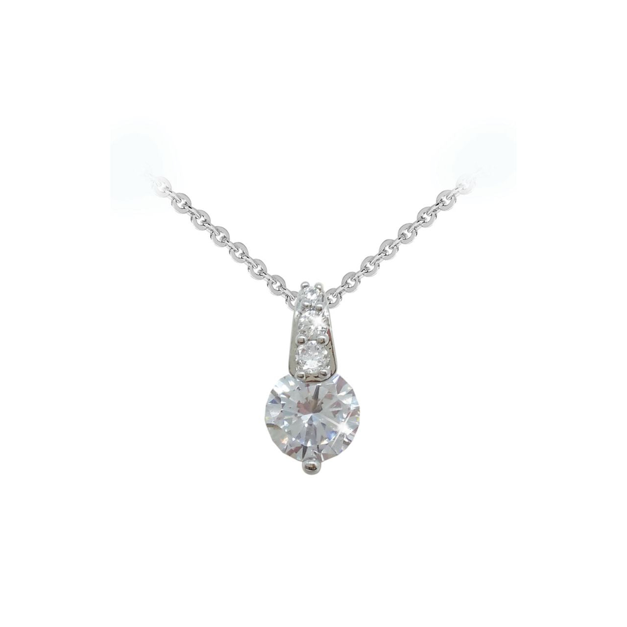 Simple, yet captivating, this stunning pendant will complement any look. Crafted in cool silver, the pendant showcases a single luminous centre stone in a unique single prong setting. Above, a trio of beautiful clear, round crystals line the polished linear bale. Buffed to a brilliant lustre, this perfectly elegant pendant glides freely along a cable chain that secures with a lobster claw clasp and a 2” extension chain.