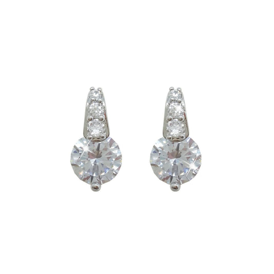 Silver Round Stud Earrings With Pave Bale by Tipperary Crystal  Simple, yet captivating, these stunning solitaire earrings will complement any look and take you from day to evening wear with ease. Fashioned in precious silver, each features a single luminous centre stone in a unique single prong setting