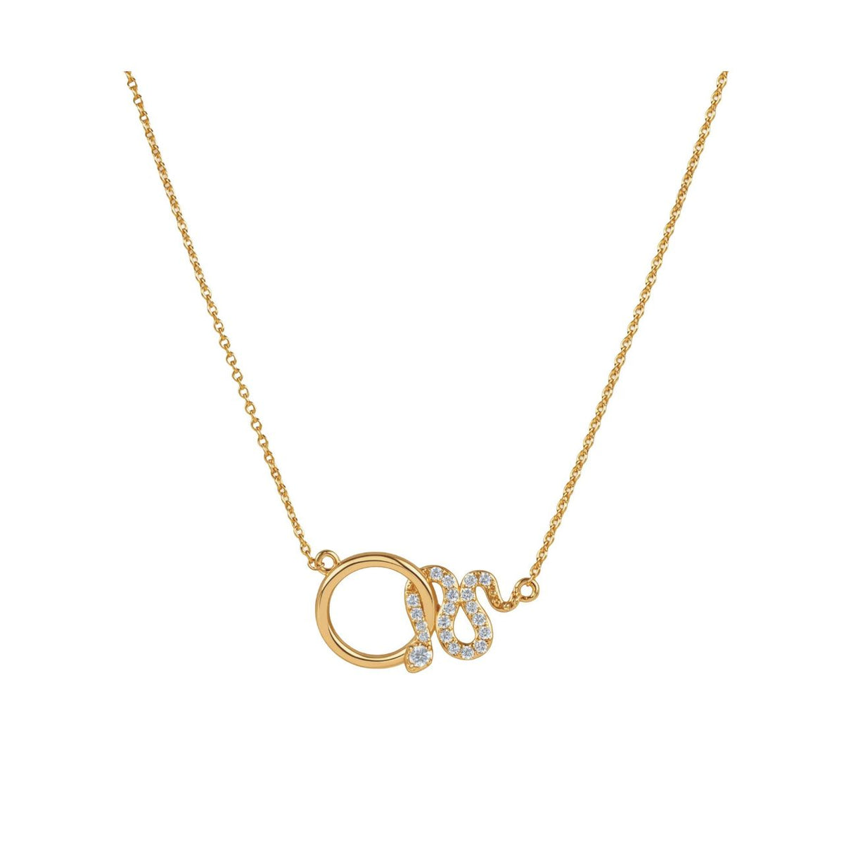This gold necklace features a polished circle linked to a snake set with clear stones. It can be worn on its own to dress up a daytime outfit or layered with other necklaces from the Snake collection.