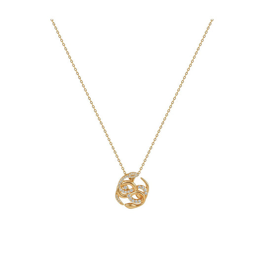 This gold Medusa pendant is made up of intertwined snakes, some polished and some set with clear stones. It makes a striking piece on its own and pairs well with other pieces from the Snake collection. It secures with a lobster claw clasp.