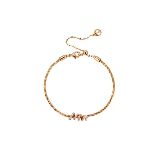 This gold snake chain bracelet carries a sparkling snake coiled around the chain. Wear it on its own or pair it with the matching necklace for a coordinated look. It secures with an adjustable lobster claw clasp.