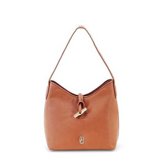 Discover the perfect combination of style and functionality with the Tipperary Soiree Handbag in Tan. Made by Tipperary, this handbag's sleek design features multiple pockets and a spacious interior, making it the ideal accessory for any occasion. Elevate your wardrobe with this must-have accessory.
