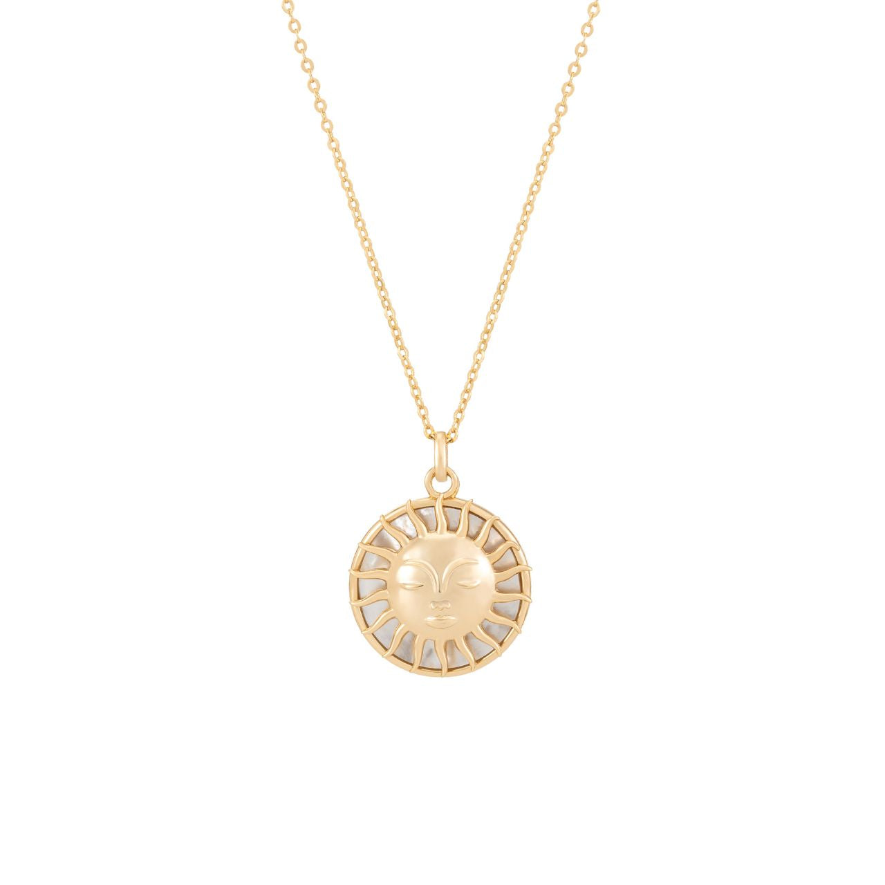 Elevate your style with the TC Soleil Sun Pendant with Mother of Pearl Disc in Gold. This striking pendant features a radiant sun face design delicately placed on a lustrous mother of pearl disc.