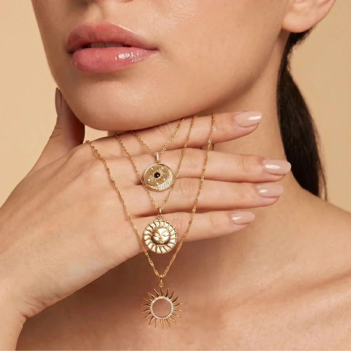 Elevate your style with the TC Soleil Sun Pendant with Mother of Pearl Disc in Gold. This striking pendant features a radiant sun face design delicately placed on a lustrous mother of pearl disc, measuring 21 x 18.1 mm. Suspended on a 500 mm adjustable chain, it offers versatility and elegance, making it the perfect accessory to enhance any look with a touch of sophistication and natural beauty.