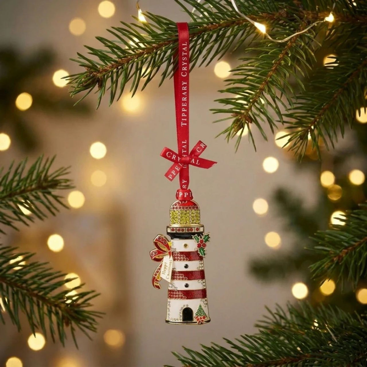 Bring a little coastal charm to Christmas with this beautiful Sparkle Lighthouse decoration.