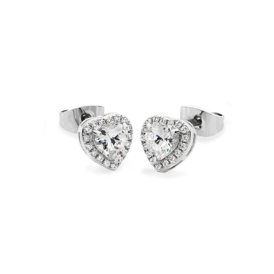 Sterling Silver Diamante Heart Stud Earrings by Tipperary  Crafted in Sterling Silver, each eye-catching stud earring features an enchanting heart-shaped clear crystal center stone framed with a border of shimmering crystal accents. Buffed to a bright lustre, these earrings secure comfortably with push backs.