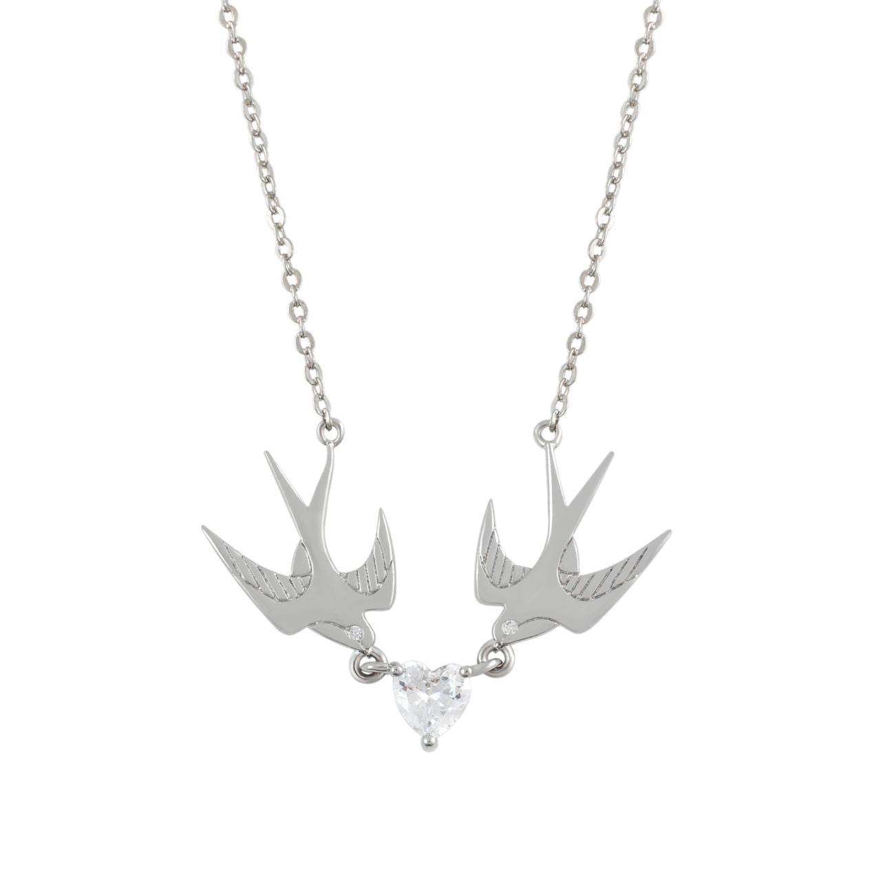 The Swallow Pendant 2 Swallows and Heart CZ – Silver showcases two silver swallows soaring towards a radiant heart-shaped CZ crystal. This pendant represents love, freedom, and the beauty of connection. With its graceful design and glimmering heart, it brings a sense of romance and elegance, making it an ideal accessory for any special occasion.