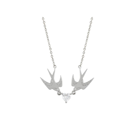 The Swallow Pendant 2 Swallows and Heart CZ – Silver showcases two silver swallows soaring towards a radiant heart-shaped CZ crystal. This pendant represents love, freedom, and the beauty of connection. With its graceful design and glimmering heart, it brings a sense of romance and elegance, making it an ideal accessory for any special occasion.