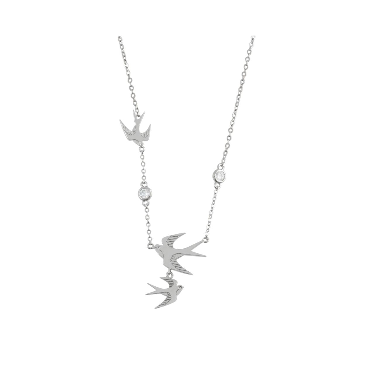 The Swallow Pendant 3 Swallows &amp; Clear CZ – Silver is a stunning piece that embodies freedom and elegance. It features three gracefully soaring swallows, symbolizing adventure and fresh beginnings. The detailed design, adorned with shimmering clear CZ crystals, adds a touch of brilliance and sophistication.