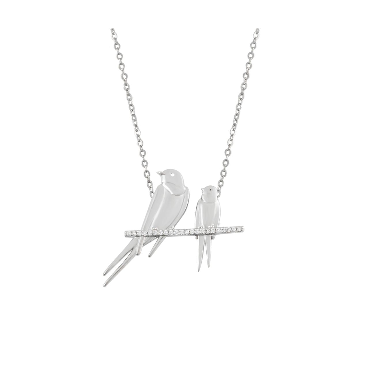 The Swallow Pendant &nbsp;Two Swallows at Rest – Silver &nbsp;is a beautifully detailed piece that symbolizes peace, love, and harmony. This pendant features two swallows perched delicately on a branch, capturing a serene and tranquil moment. Its elegant design and lustrous silver finish make it a timeless accessory, perfect for adding a meaningful touch to any outfit.
