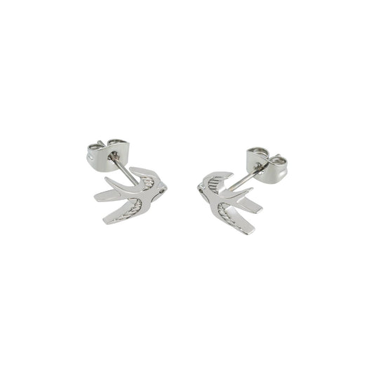 The Swallow Stud Earrings – Silver feature a delicate design of a swallow in mid-flight, symbolizing freedom and grace. &nbsp;These earrings add a subtle touch of elegance to any look. Their timeless design makes them perfect for both everyday wear and special occasions, offering a charming and sophisticated accent to your jewellery collection.