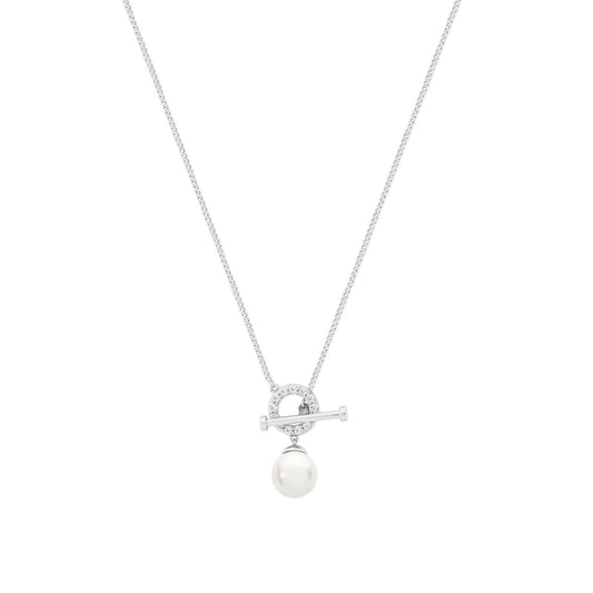 Silver T-Bar Pendant With Pearl by Tipperary  This chic, silver T-Bar pendant from Tipperary expertly combines traditional design with a modern twist. With a classic pearl center, this piece adds a timeless sophistication to any outfit. Elevate your style with this high-quality pendant.