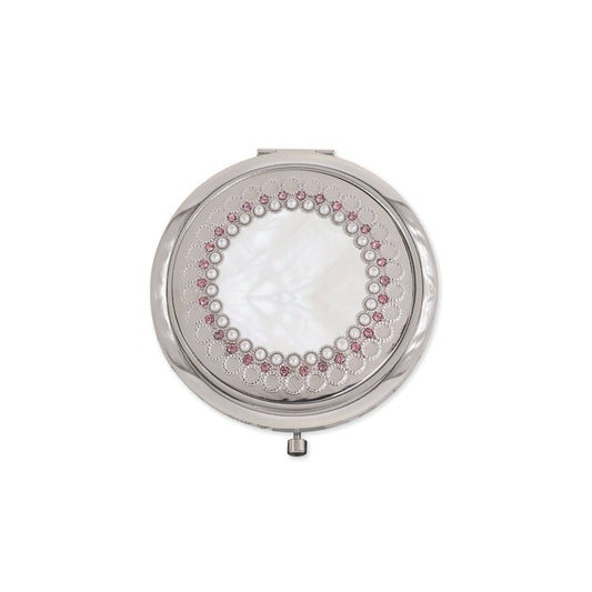 Designed with travel in mind, this elegant silver plated vintage pearl compact mirror from Tipperary is the perfect staple of any woman's handbag. A great gift for any lady in your life.