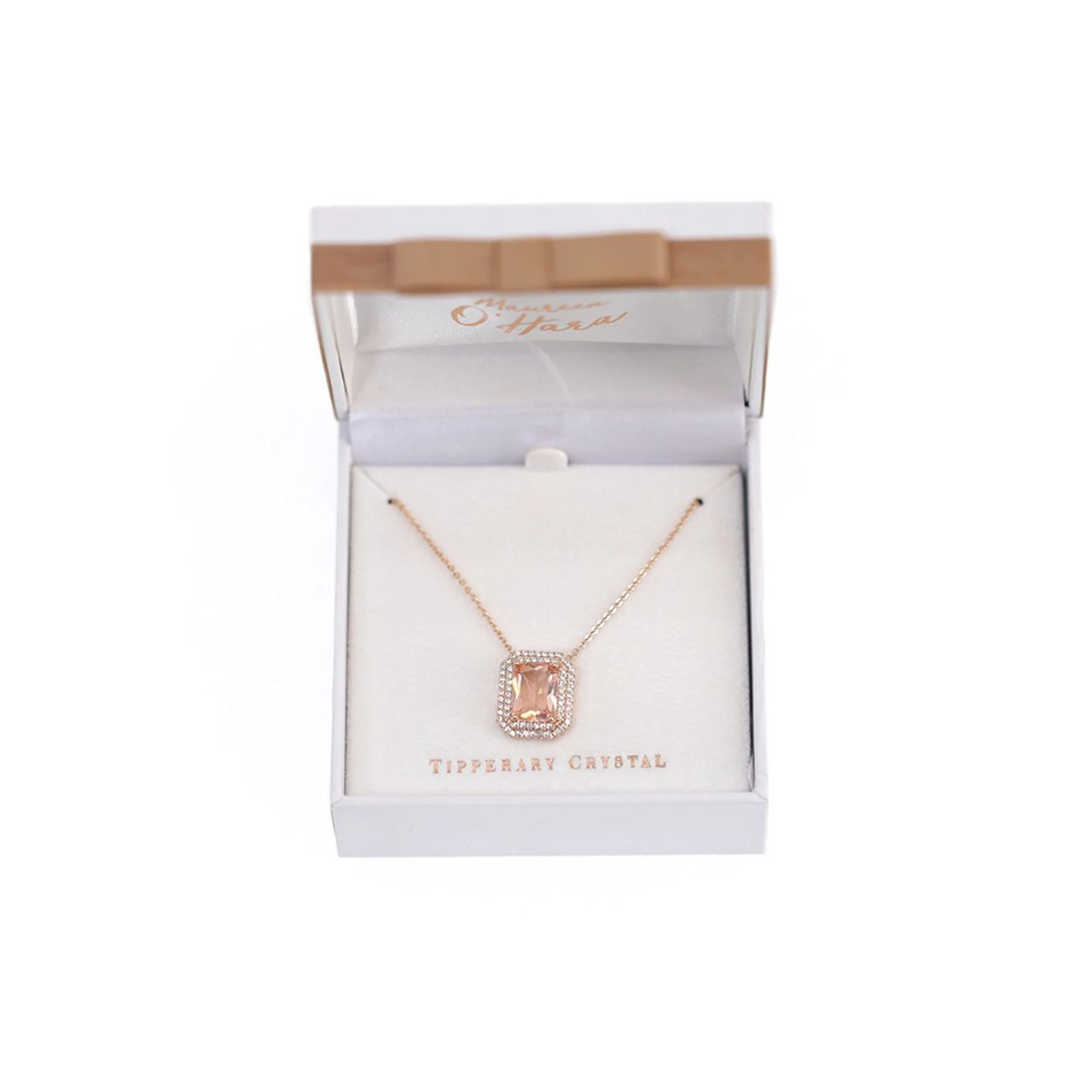 An elegant eye-catching glamourous pendant. Fashioned in a beautiful soft peach colour, the classic contemporary rectangular stone is set within a beautiful CZ mounting. Can be worn day or night to dress up any outfit.