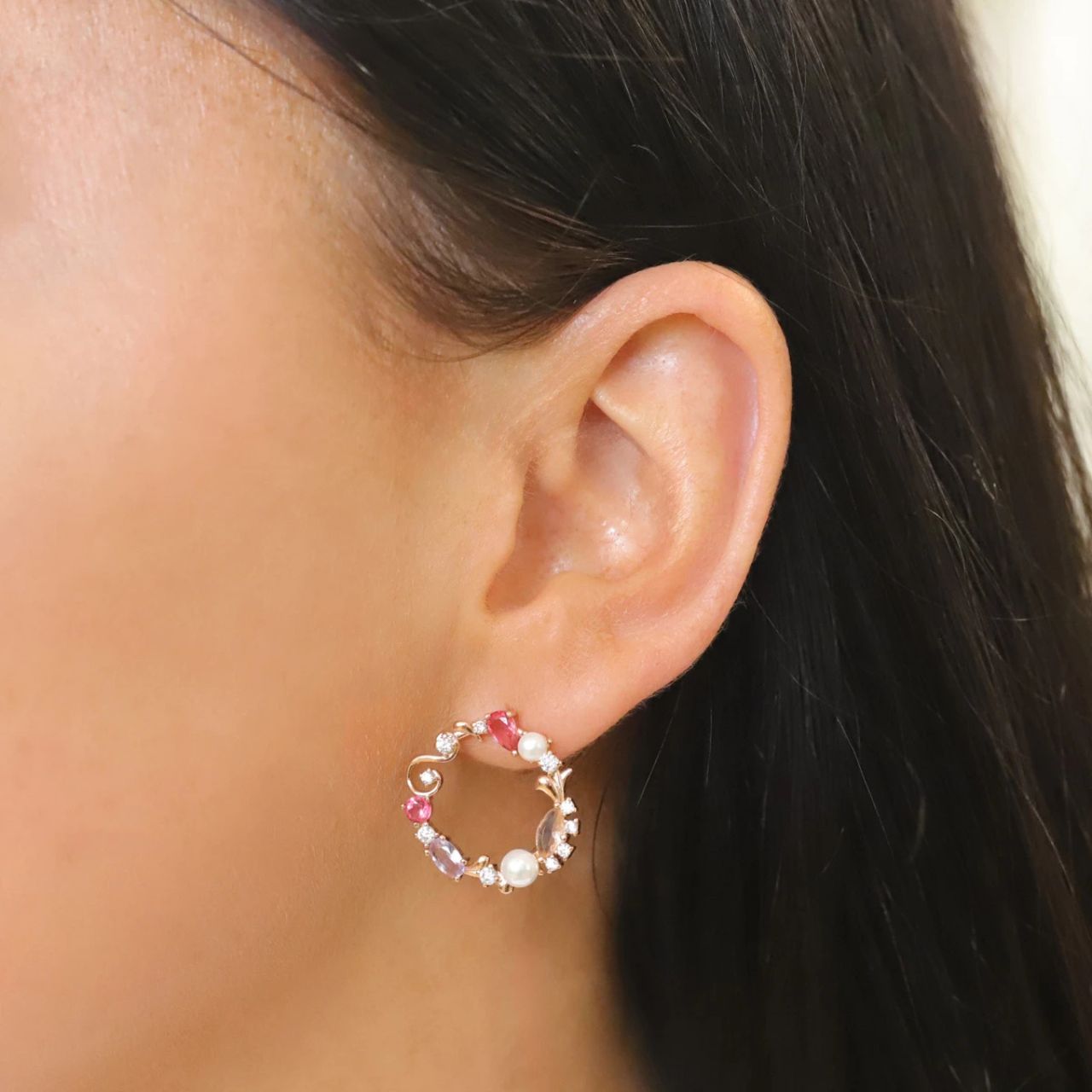 These fabulous earrings are the perfect example of classic contemporary fashion. An organic circle of shimmering vintage multi-coloured CZs create these magnificent earrings. They sit beautifully on the ear and secure comfortably with push back.