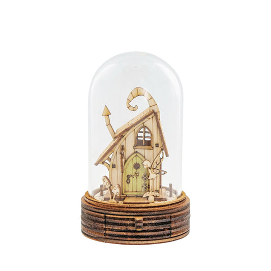 Everyone knows the story of the Tooth Fairy and now Kloche has a new way to bring that magic to your children. This glass dome decoration encases a detailed miniature of the Tooth Fairy themself in front of their Fairy home. What sets this apart from other pieces in the collection, is the little drawer built into the bottom, the perfect size for those lost teeth or a little treat from the Fairy.
