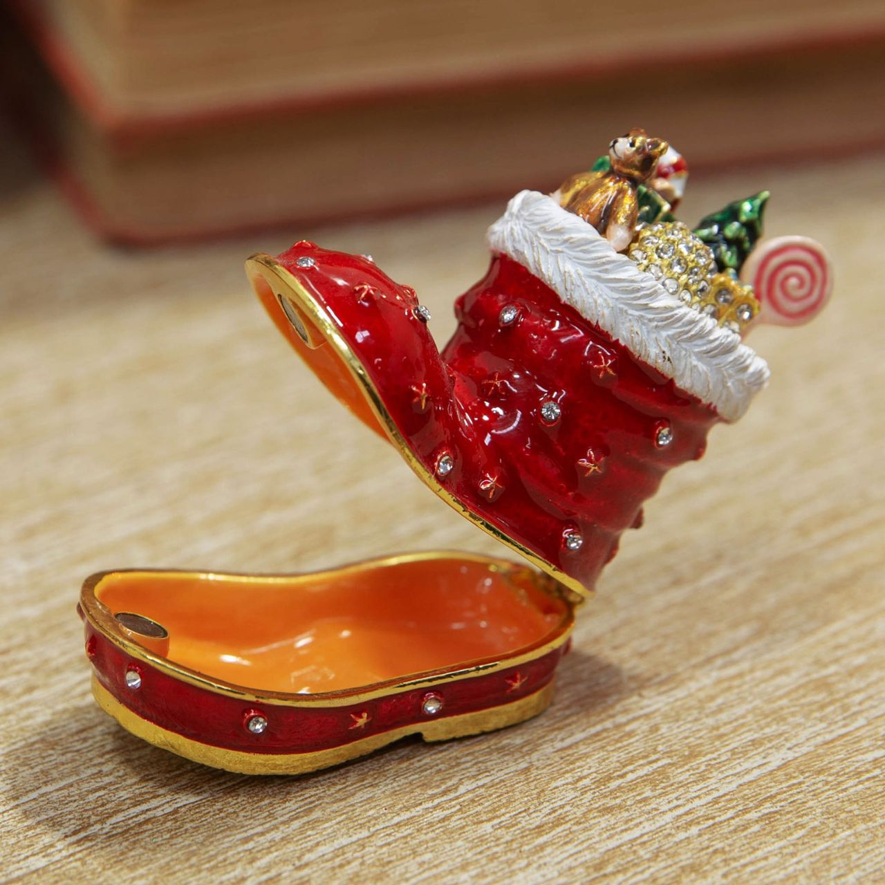 Brighten your shelves this Christmas with this wonderfully cheerful handpainted Christmas boot Treasured Trinket box. From the Christmas Treasured Trinkets range, part of the Royal Affair collection by Santa's Workshop - step into an opulent Christmas fairy tale.