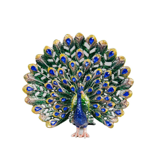 Painted in the glorious colours of a Peacock and its plumage, this peacock trinket with adorned with blue crystals that finish this wonderful ornament perfectly.