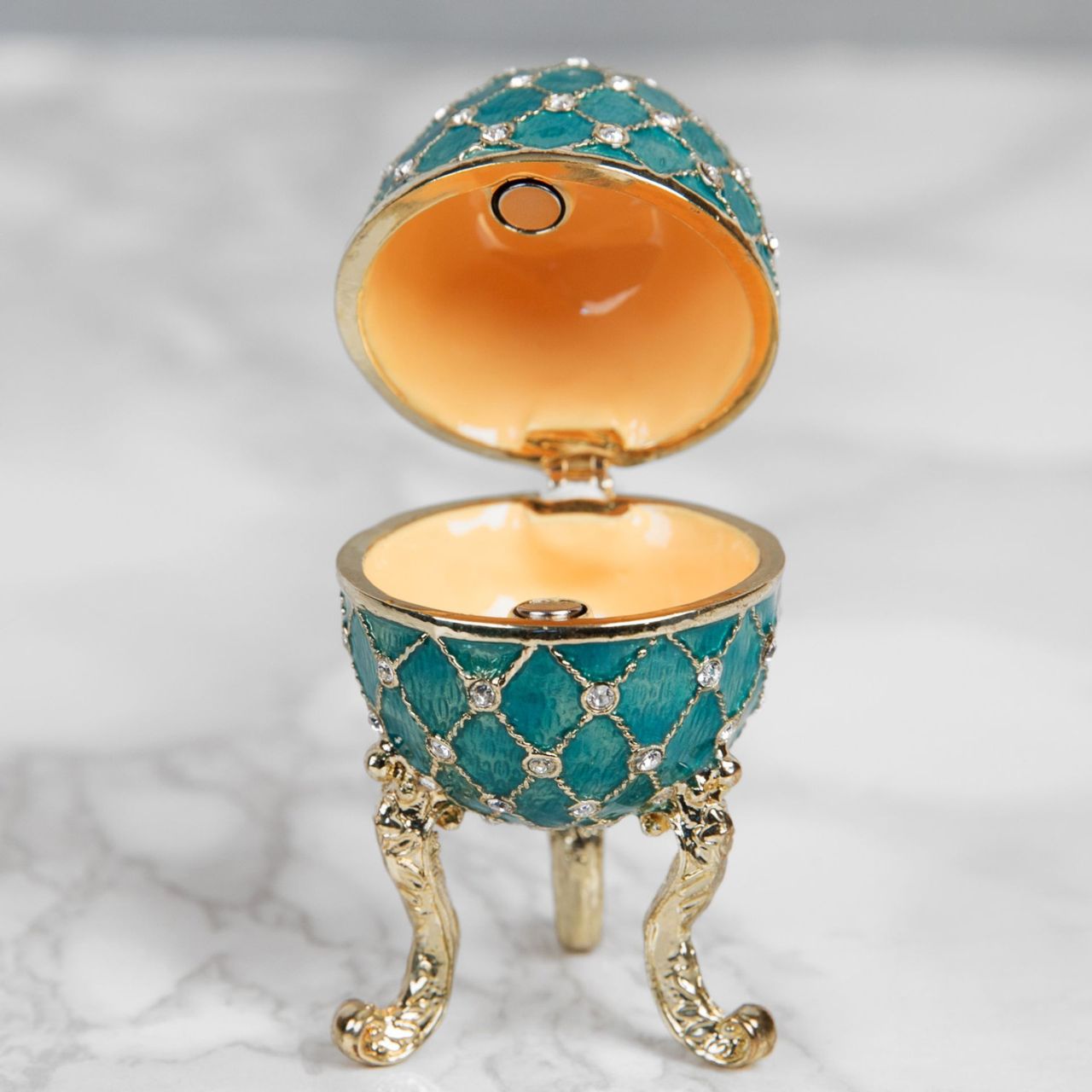 A beautiful, hand painted and crystal finished Fabergé Egg style Trinket Box from Treasured Trinkets.