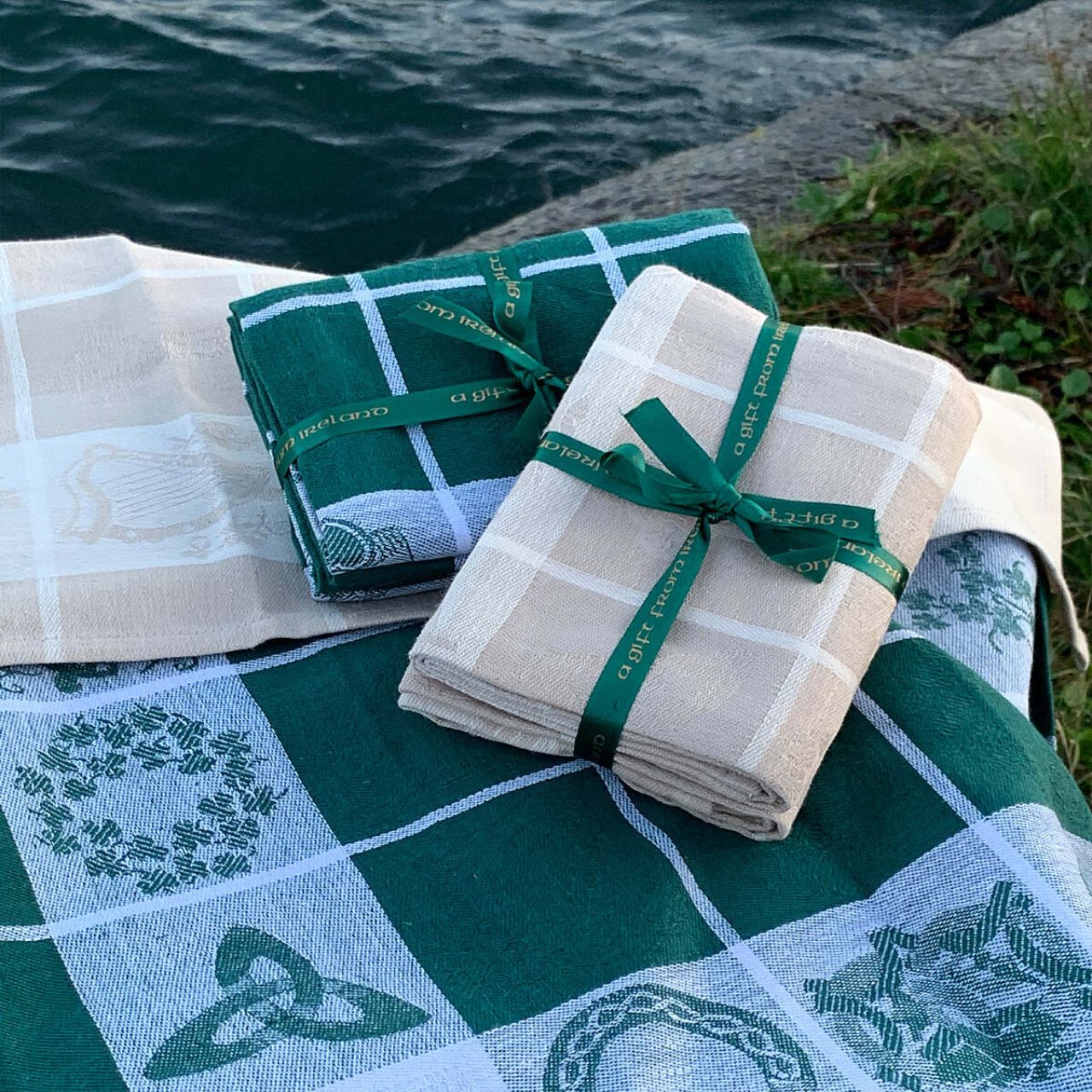 Treasures of Ireland Tea Towel Green by Samuel Lamont  Treasure of Ireland linen union tea towel in beautiful Irish green. This striking colourway comes as a bale of two, tied with elegant green ribbon. Perfect for gifting as a keepsake souvenir with it's iconic Irish symbols.