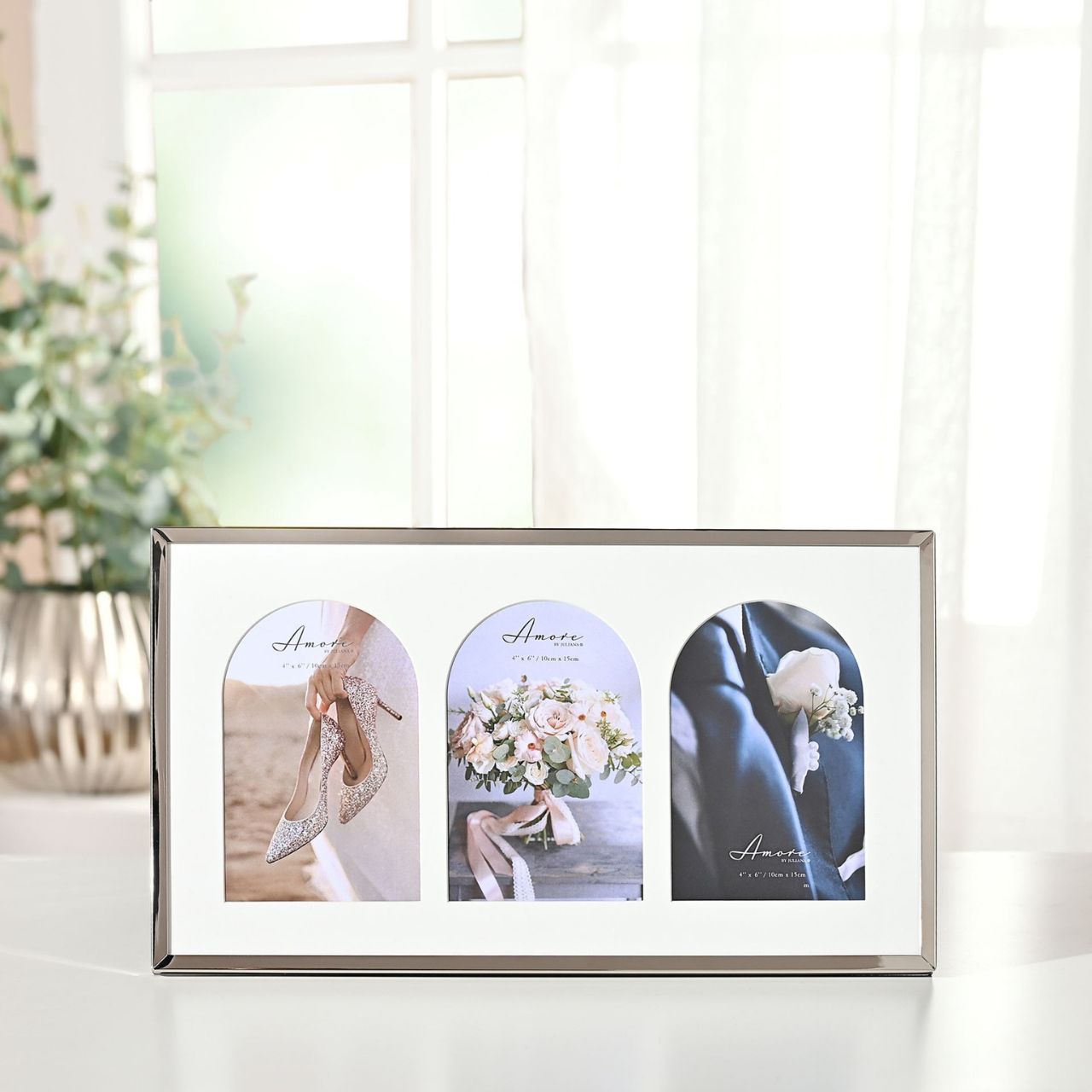 An AMORE BY JULIANA Triple Photo Frame with Arch Mounts, an exquisite addition to your range of wedding and anniversary gifts. Part of a stunning new collection that are all influenced by the trend in curves and arches.
