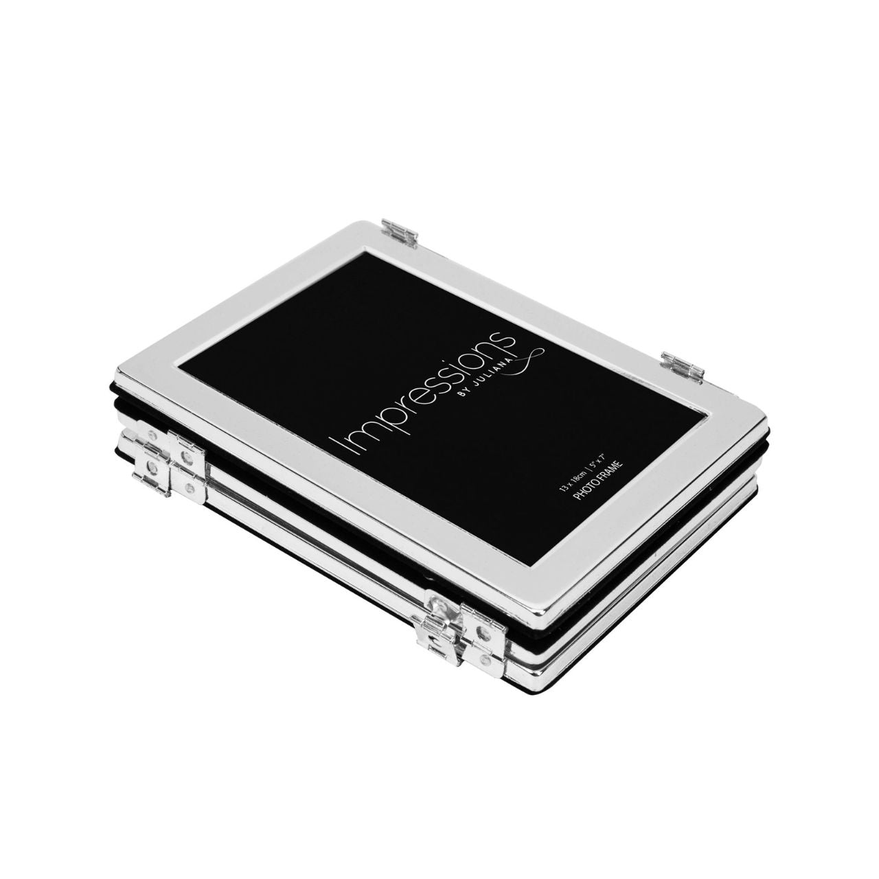 A hinged silver plated triple aperture photo frame from IMPRESSIONS by Juliana.
Each of the three apertures measures 5" x 7". Complete with standing strut and branded packaging.