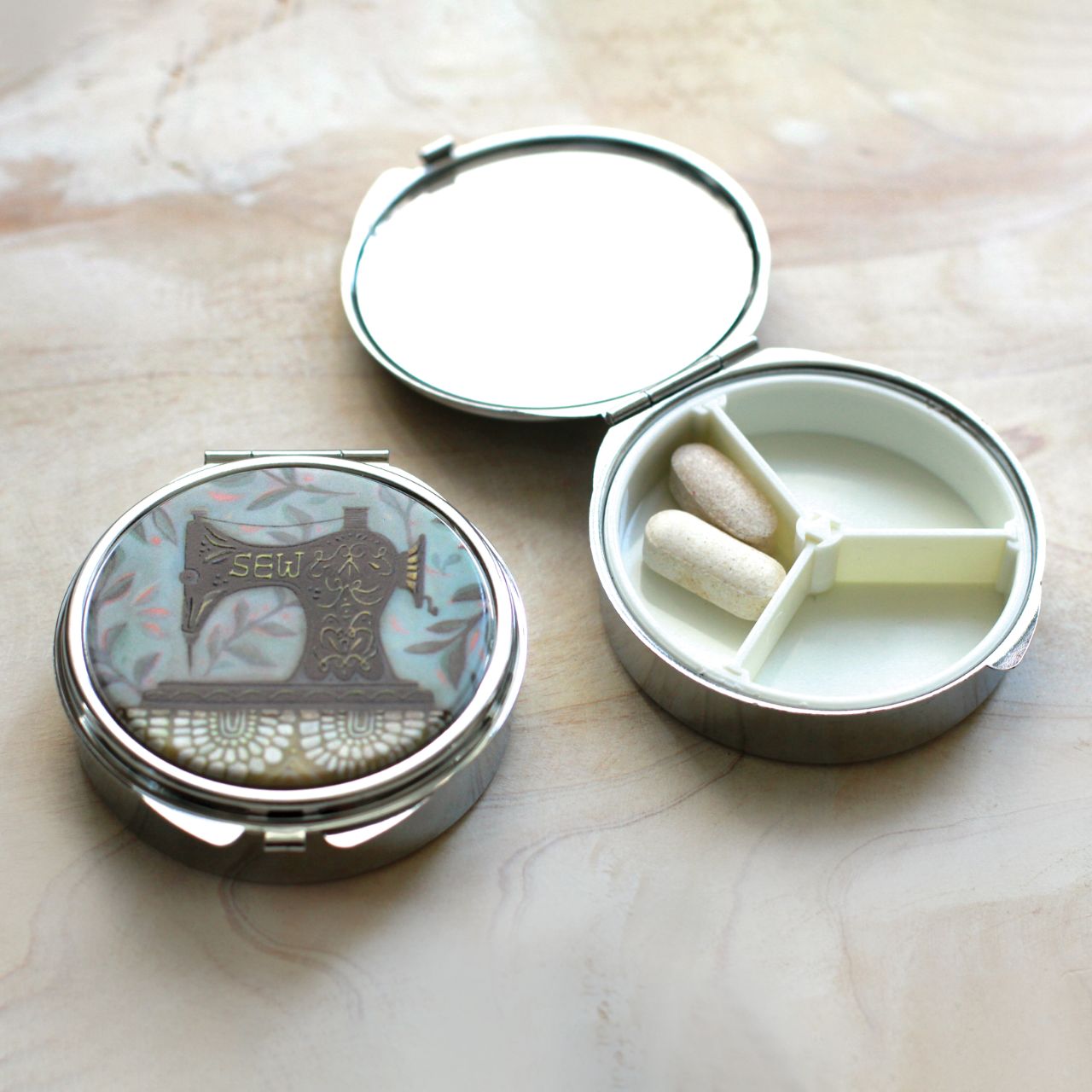 Michelle Allen Vintage Stitch Trinket Box  This lightweight and durable Stitch trinket box makes a splendid gift for a friend or yourself. They are the perfect size to fit in any purse, make-up bag, carry on, or backpack. And best of all, they are super practical for every day use.