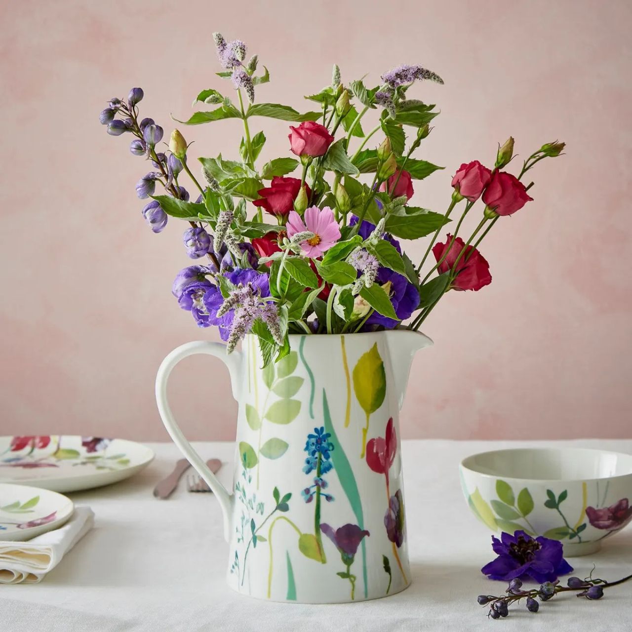 Whether you're serving ice-cold water or a refreshing cocktail, brighten up your table with this gorgeous porcelain jug from Portmeirion. Made for entertaining, the jug features a large handle and curved spout for the perfect pour. 