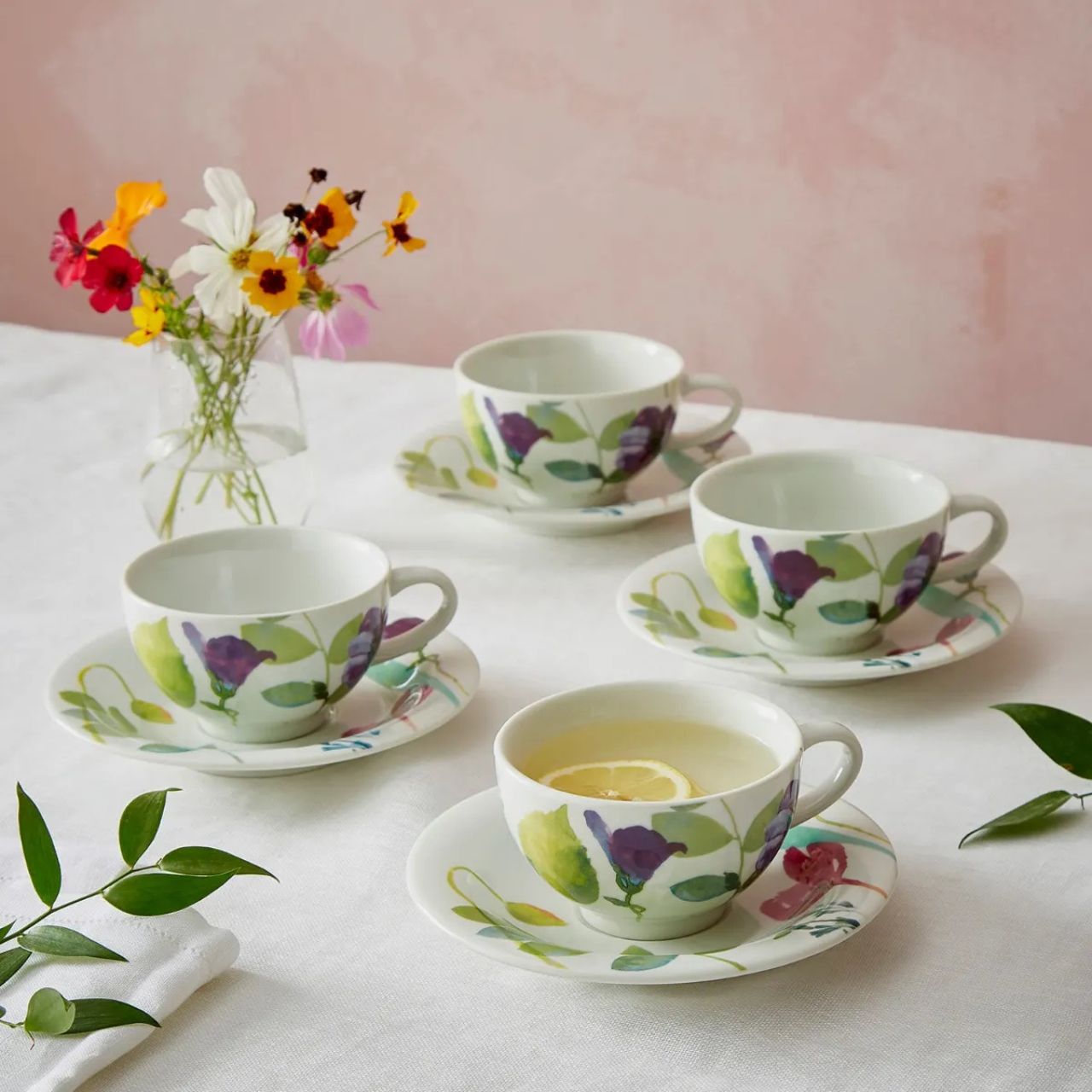 This vibrant, floral breakfast cup and saucer set will brighten up every morning. With a generous capacity, these porcelain cups are decorated with the Water Garden pattern in pretty pastel shades.