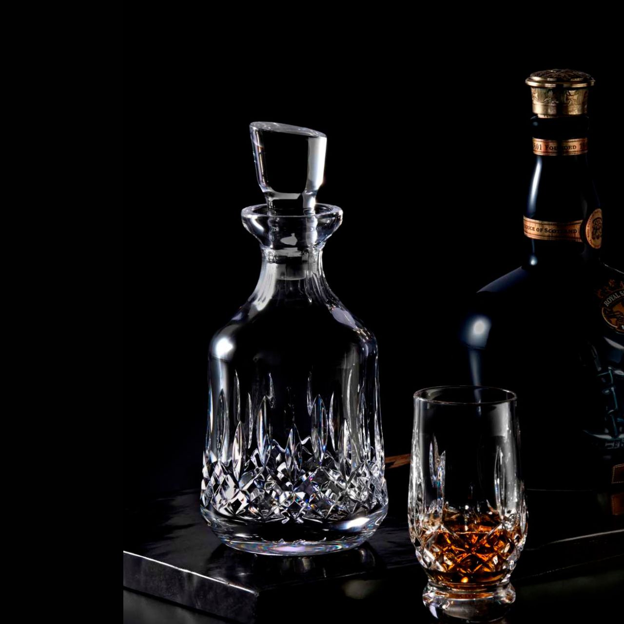 Waterford Crystal Lismore Bottle Shaped Decanter  By Waterford Crystal, Based on the world’s best-selling Lismore crystal pattern famous for its signature diamond and wedge cuts, the Lismore Gift Bar Collection has been inspired by the rich heritage of Ireland and reimagined in a modern way with pieces designed to be used and enjoyed.