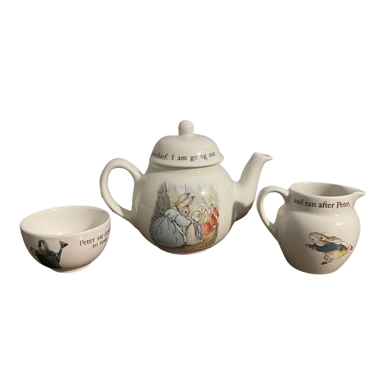 Experience the charm of Beatrix Potter's beloved character, Peter Rabbit, with our Vintage porcelain Children's Tea Set by Wedgwood. This 3 piece set includes a teapot, cup, and saucer, all adorned with delicate illustrations and crafted with renowned Wedgwood quality. Share precious moments and create cherished memories with this timeless tea set.
