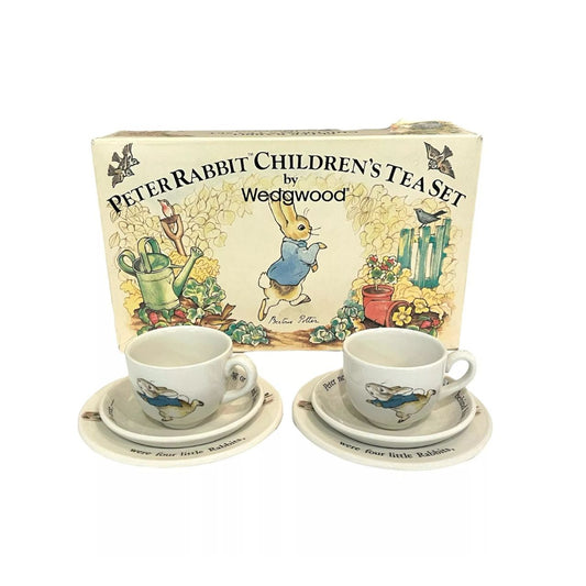 Experience the charm of Beatrix Potter's beloved character, Peter Rabbit, with our Vintage porcelain Children's Tea Set by Wedgwood. This 6 piece set includes a 2 Plates, 2 Teacups & 2 Saucers, all adorned with delicate illustrations and crafted with renowned Wedgwood quality.