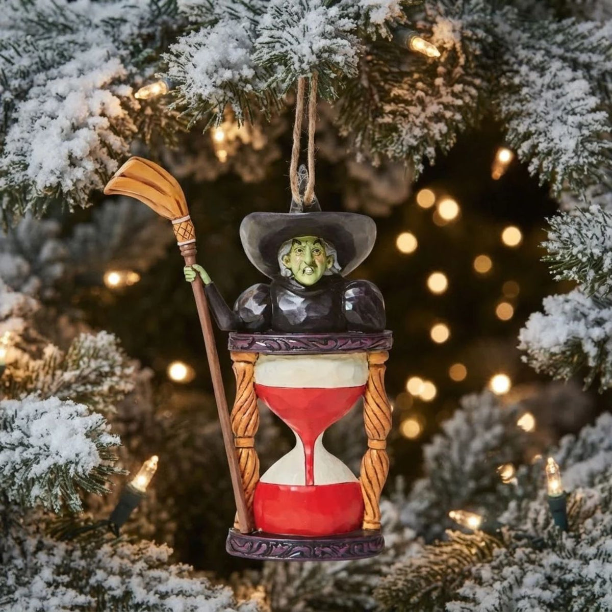 Someone looks unhappy in this hourglass ornament. As the sands of time fall, the Wicked Witch frowns knowing it's only a matter of time until good wins the day.