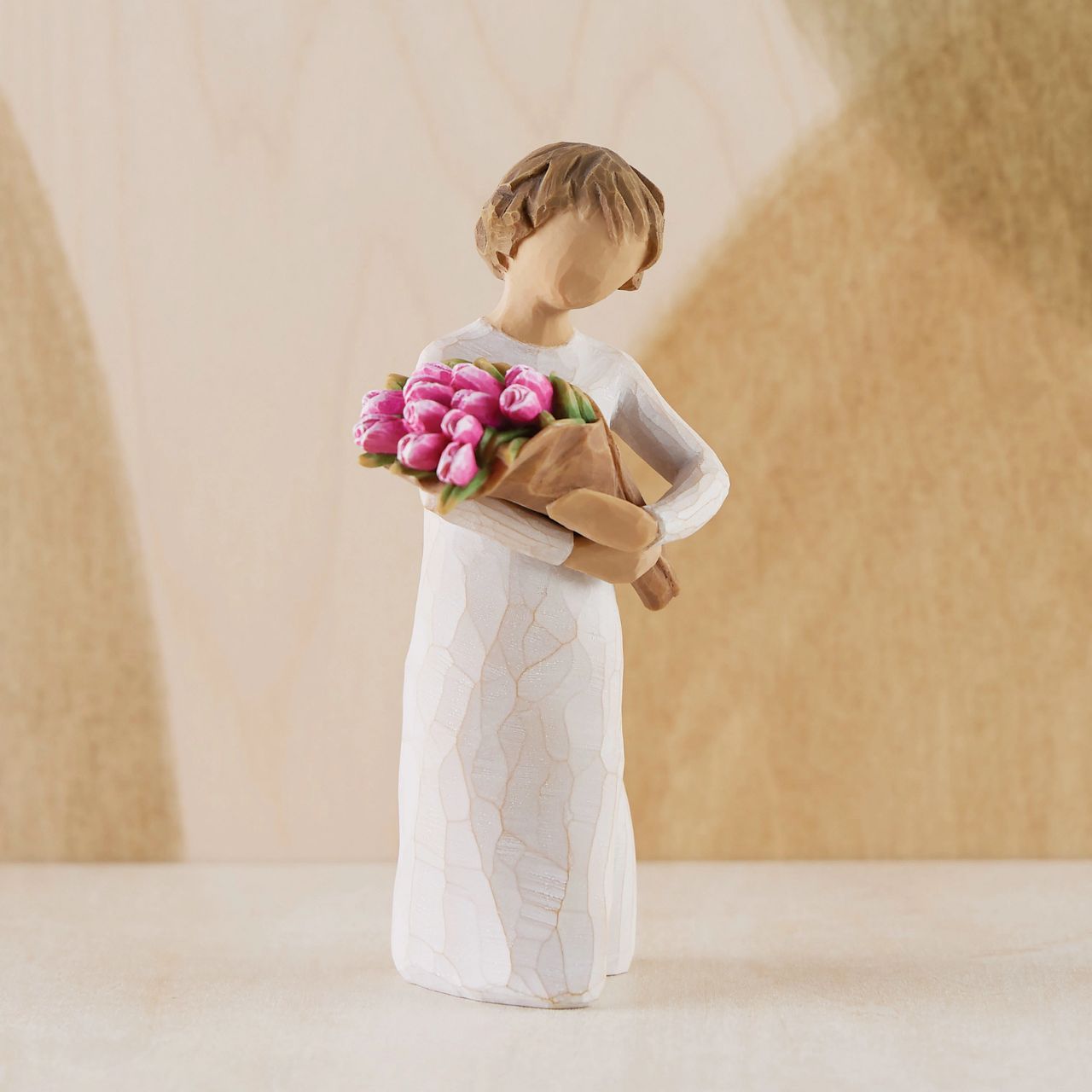 The bright and boldly pink colour of these tulips can represent courage, strength and confidence. One of the earliest blooms in spring, tulips are associated with hope and renewal. The large bouquet can represent one's community of support and friendship.