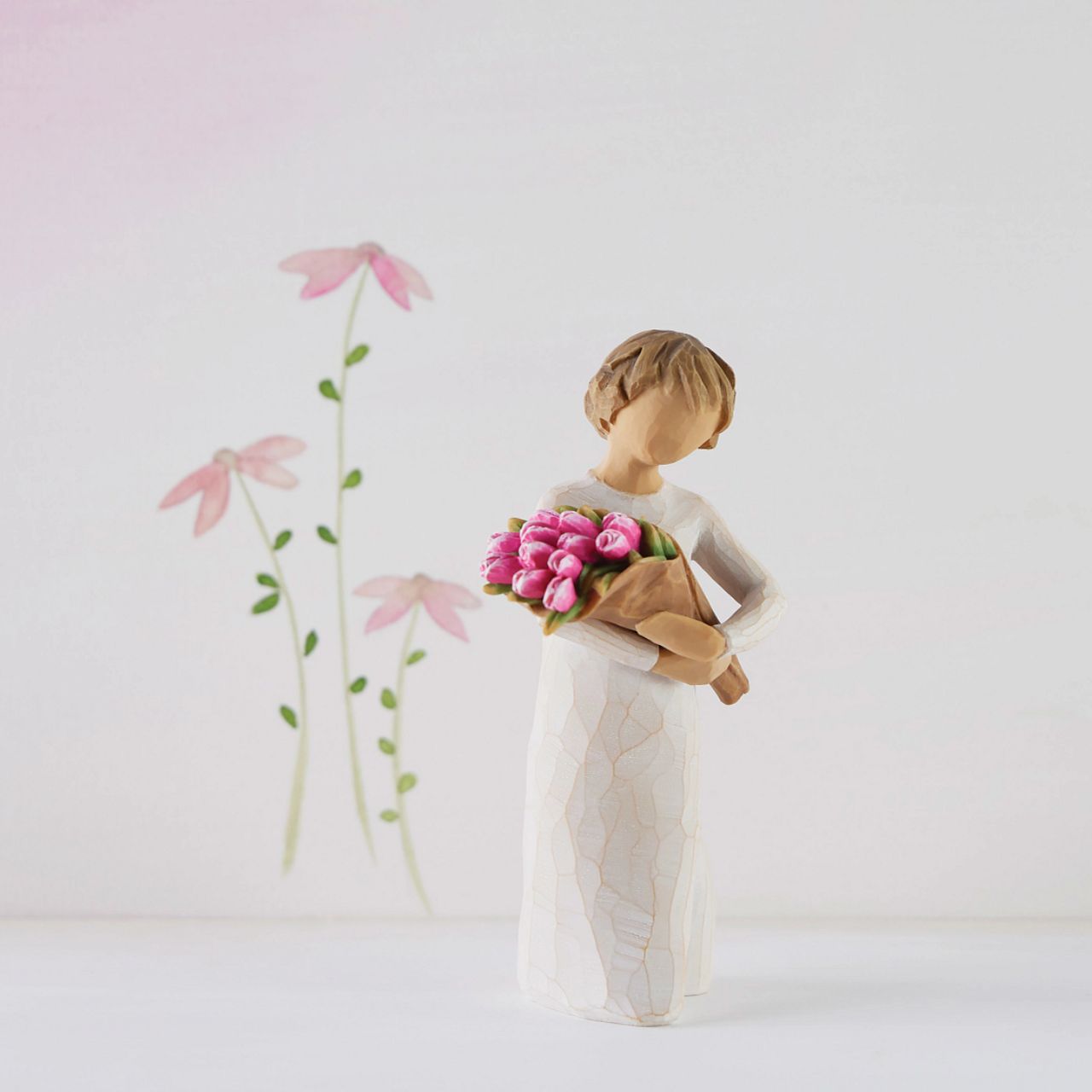 The bright and boldly pink colour of these tulips can represent courage, strength and confidence. One of the earliest blooms in spring, tulips are associated with hope and renewal. The large bouquet can represent one's community of support and friendship.