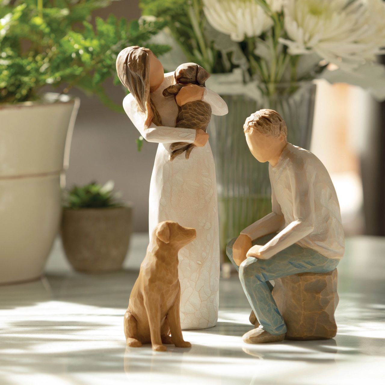 Adorable You - Dark Dog by Willow Tree  Willow Tree is an intimate line of figurative sculptures representing sentiments of love, closeness, healing, courage, hope...all the emotions we encounter in life " When carving this figurine, I was influenced by the postures of classical sculptures, where the line of the shoulders is in opposition to the hips, or contrapposto.