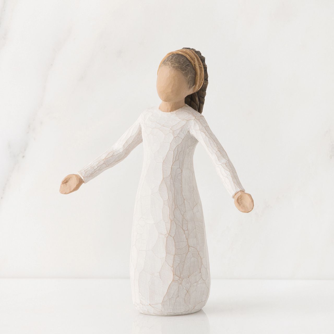 A gift to support and encourage hope and healing. Can be added to Nativity display. "This is intended as a universal piece of goodwill... her hairstyle and gold-flecked hair band suggest an aura of celebration and specialness. Blessings is a little reminder to count our blessings every day. She speaks to any denomination or ethnicity.
