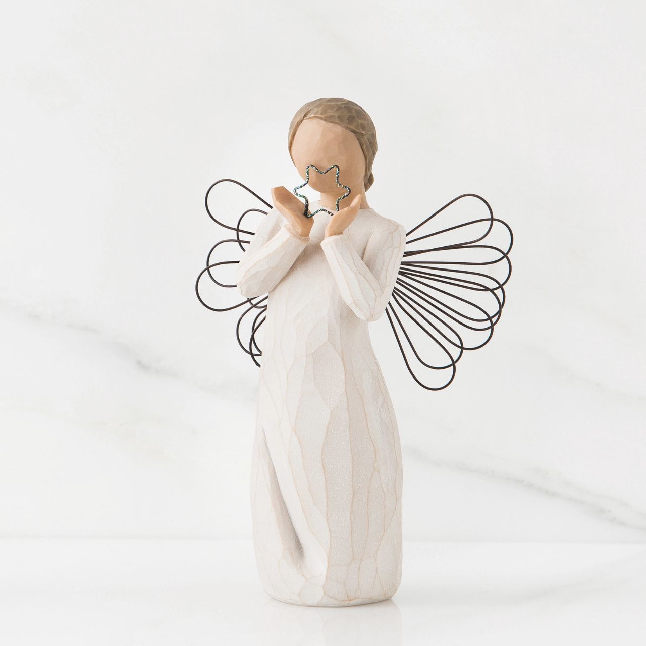 Bright Star by Willow Tree  A gift for graduate or teacher, or to celebrate special accomplishments. Can be added to the Nativity display. "Bright Star can be a congratulatory gift to a friend or child; she can be a sparkly angel for the Nativity at Christmas time.