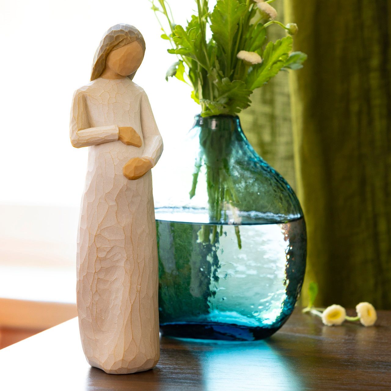 Willow Tree is an intimate line of figurative sculptures representing sentiments of love, closeness, healing, courage, hope...all the emotions we encounter in life. "With Cherish, I wanted to break new ground.