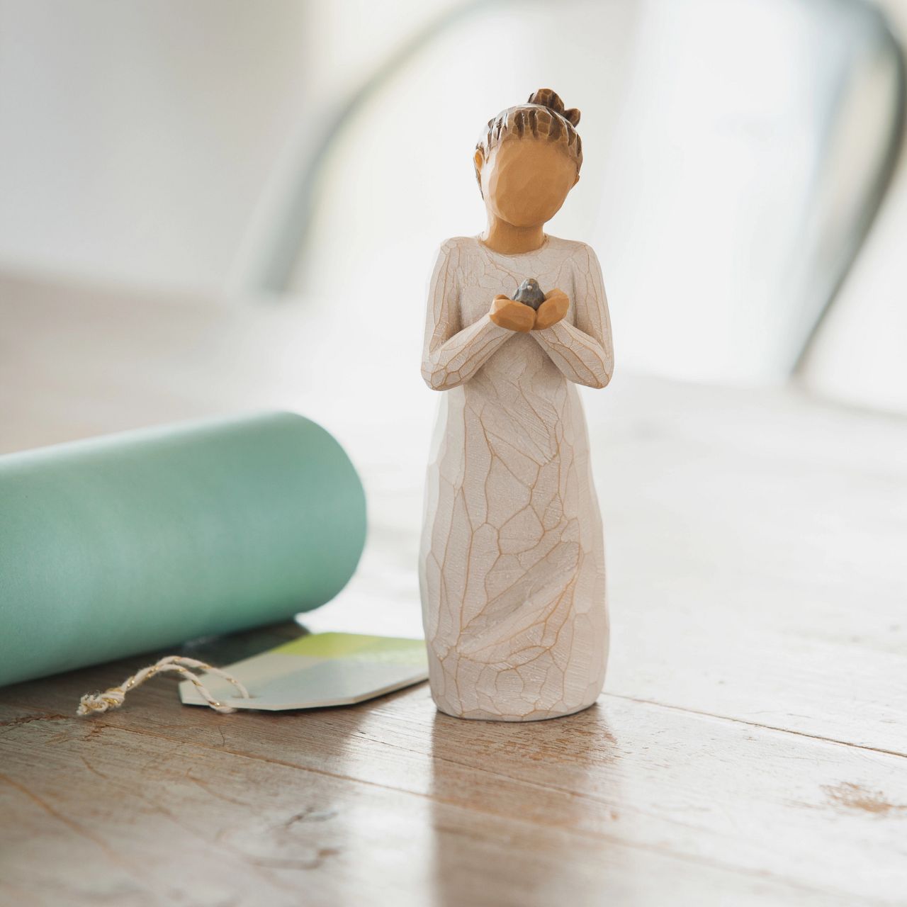 A gift to express appreciation and thankfulness for teachers, volunteers, donors, caregivers, friends ...or for those who love nature and birds. The gesture of this figurine is caring and protective.