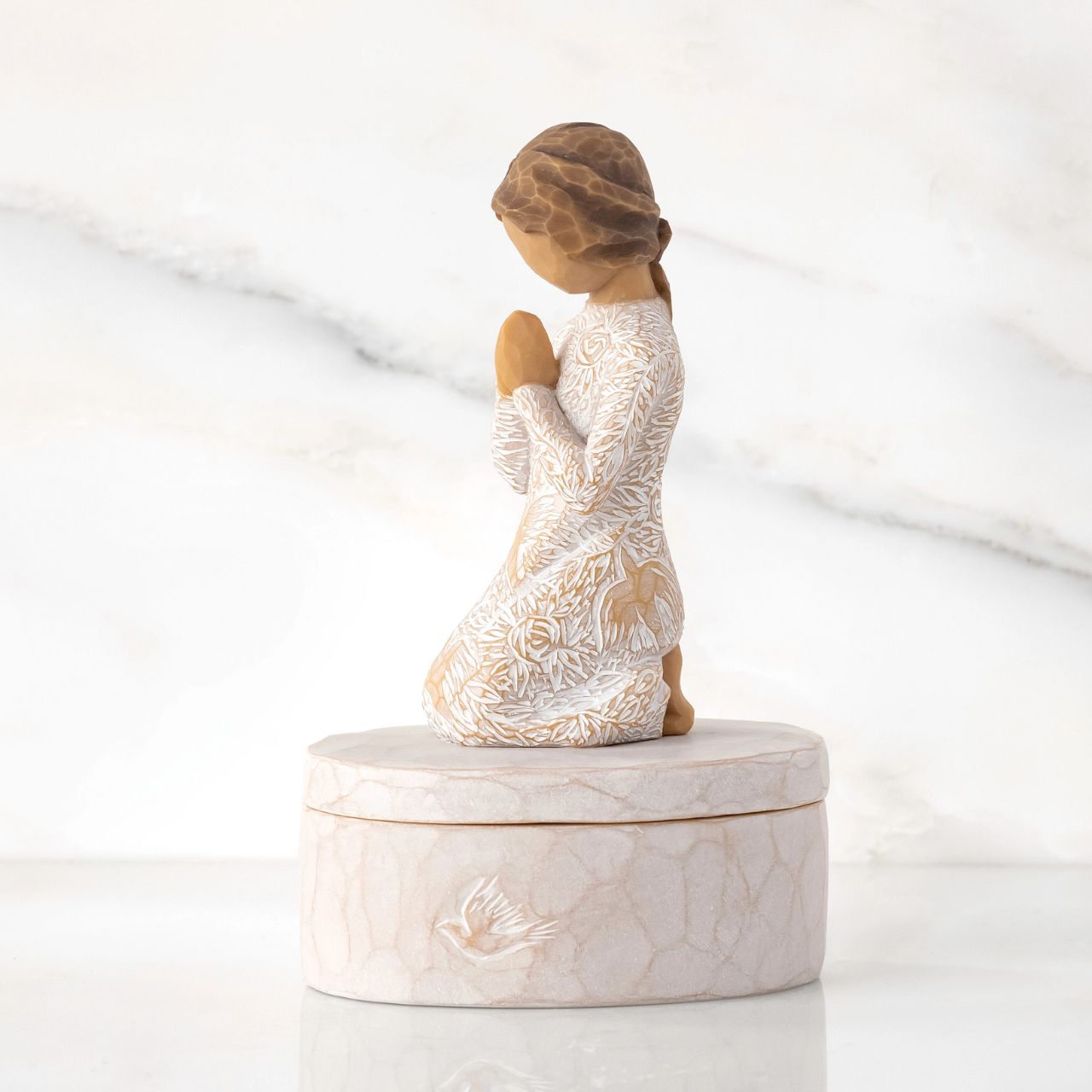 Prayer of Peace Keepsake Box by Willow Tree  ''I wanted this figure to be a humble piece, but very centering, calming, peaceful .. with a universal gesture of meditative thought. The surface of her dress is carved with texture and patterns of living natural forms. Even though this is a quiet piece, I wanted the imagery to be very alive with movement - to have an inner energy of life.'' - Susan Lordi.