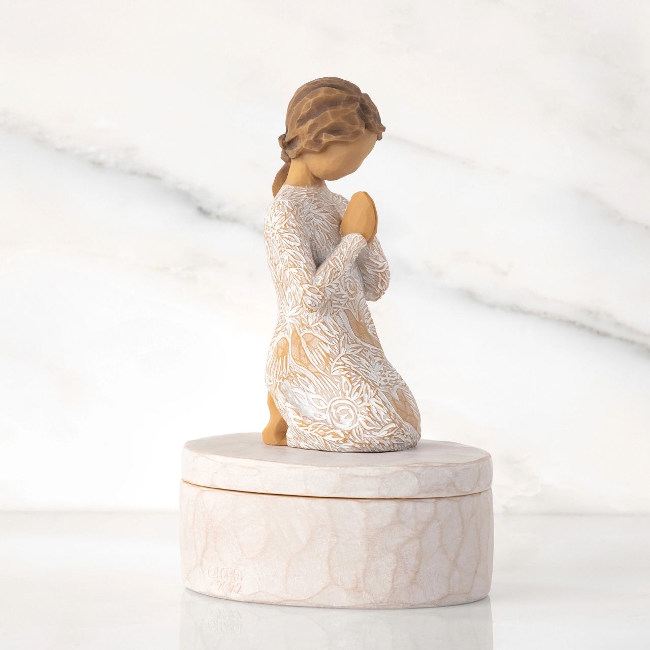 Prayer of Peace Keepsake Box by Willow Tree  ''I wanted this figure to be a humble piece, but very centering, calming, peaceful .. with a universal gesture of meditative thought. The surface of her dress is carved with texture and patterns of living natural forms. Even though this is a quiet piece, I wanted the imagery to be very alive with movement - to have an inner energy of life.'' - Susan Lordi.