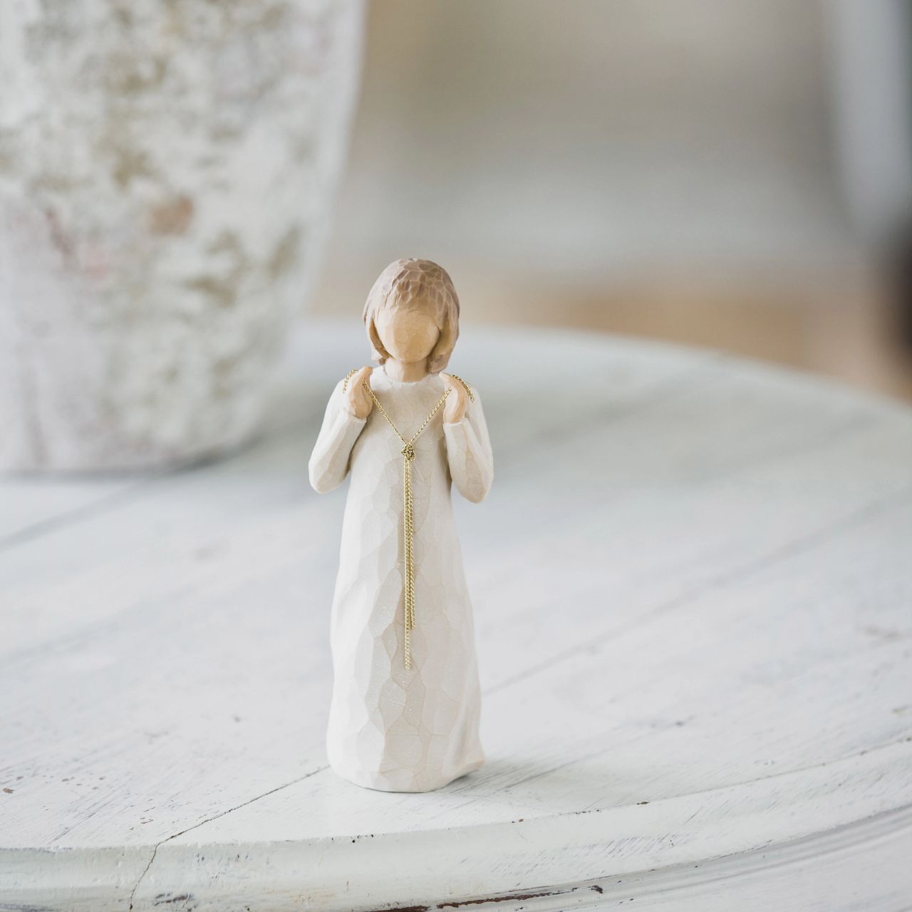 Truly Golden by Willow Tree  Willow Tree is an intimate line of figurative sculptures representing sentiments of love, closeness, healing, courage, hope...all the emotions we encounter in life. "Gold is a symbol of preciousness; the things we value.