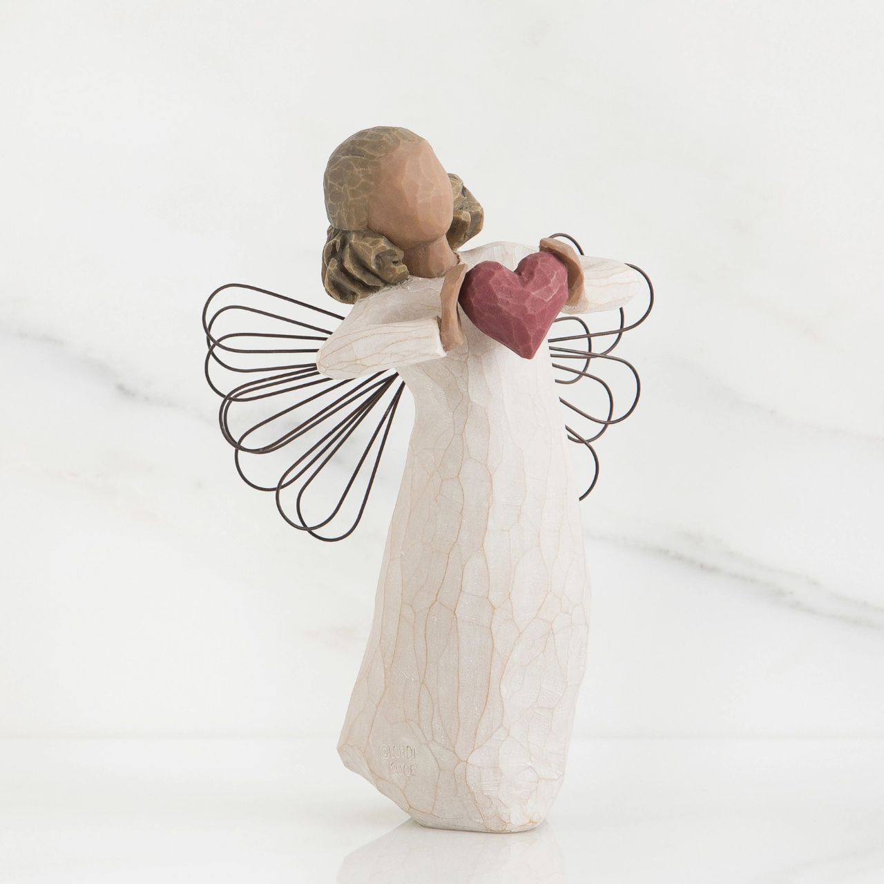 With Love by Willow Tree  Willow Tree is an intimate line of figurative sculptures representing sentiments of love, closeness, healing, courage, hope...all the emotions we encounter in life. "She's dancing... twirling... her gesture is the message. I wanted the movement of her dress, hair and hands to communicate 'you are loved'." - Susan Lordi. 