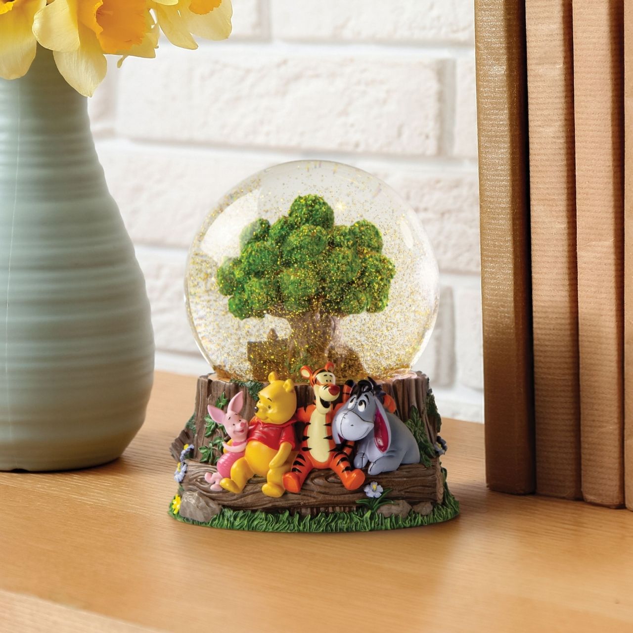 Winnie the Pooh 100th Anniversary Waterball featuring Pooh and Friends sculpted on the base and Tree House element inside.