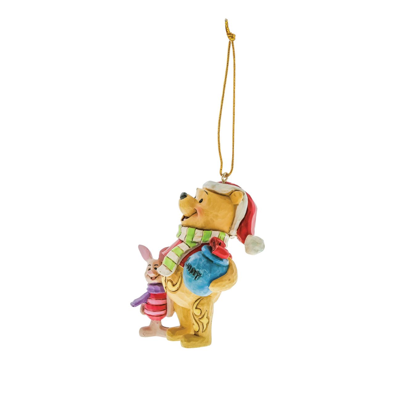 Add some friendship to your Christmas tree this season with Winnie the Pooh and Piglet. Designed by award-winning artist and sculptor Jim Shore. The hanging ornament is made from cast stone. Product is supplied in branded gift packaging.