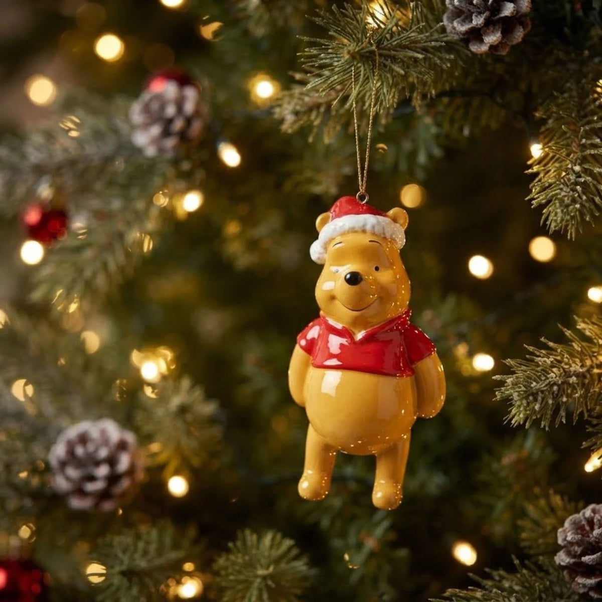 Bring festive cheer to your Christmas tree with this delightful 3D hanging ornament featuring Winnie the Pooh in his cheerful Santa hat. Perfect for Disney fans and classic character collectors, this charming decoration captures the warmth and whimsy of the beloved character.