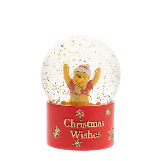 Winnie The Pooh Snowglobe 10cm "Christmas Wishes"  This 'Christmas Wishes' Winnie the Pooh Snowglobe is a fun and festive way to spread cheer over the holiday season. With a characterful Winnie figurine and lots of gold glitter, this is sure to brighten any Disney fan's day.
