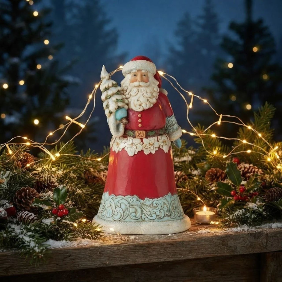 Winter Wonderland Collection; Bright jewel tones, metallic shimmering and pearlized finishes and coloured glitter accents. This striking Santa holding a glittering Tree is the perfect addition to any Winter Wonderland Collection.