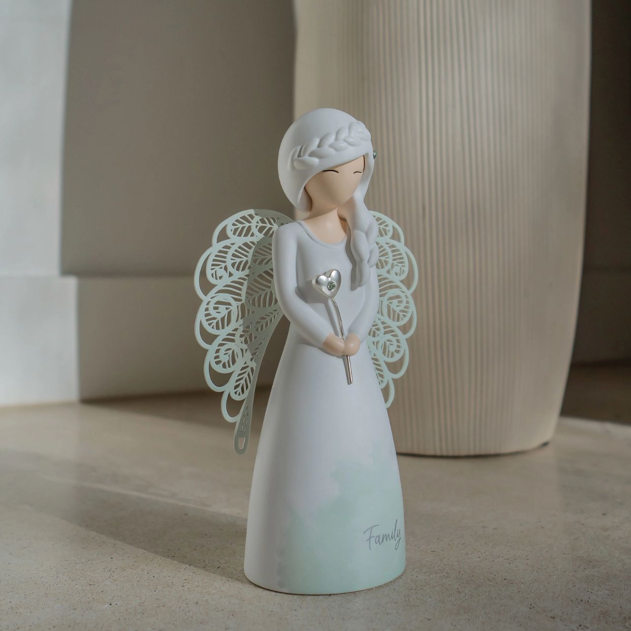 Thank You Angel Figurine - Family  Looking for a thoughtful gift that's both beautiful and meaningful? These stunning angels are the perfect way to show someone special just how much they mean to you. Standing 12.5cm tall, they are perfect as a gift and home decoration.